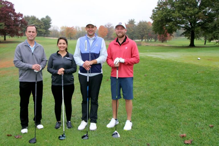 paulson-guarino-sylvia-miller-golfing_orig